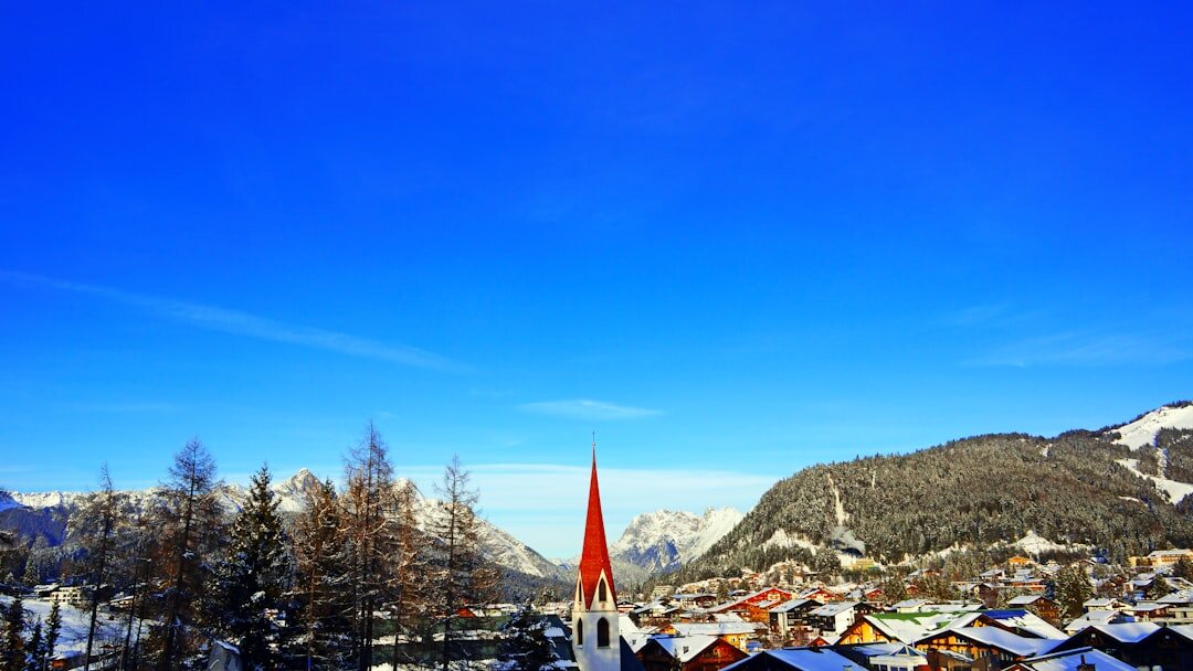 Exclusive alpine village of Gstaad with wooden chalets in winter